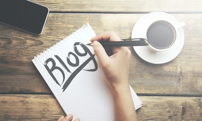 woman writing blog
