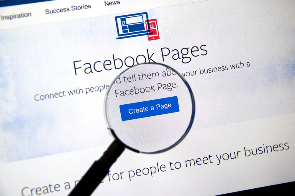 lupa no botão Criar página do site Facebook