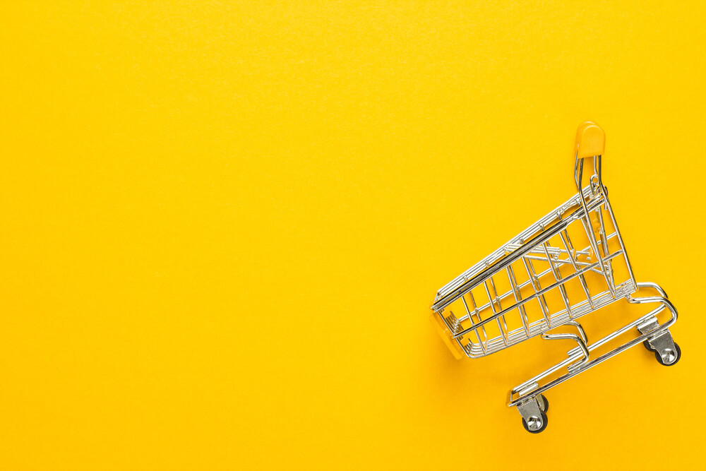 ilustraçao representando carrinho de compras em fundo amarelo