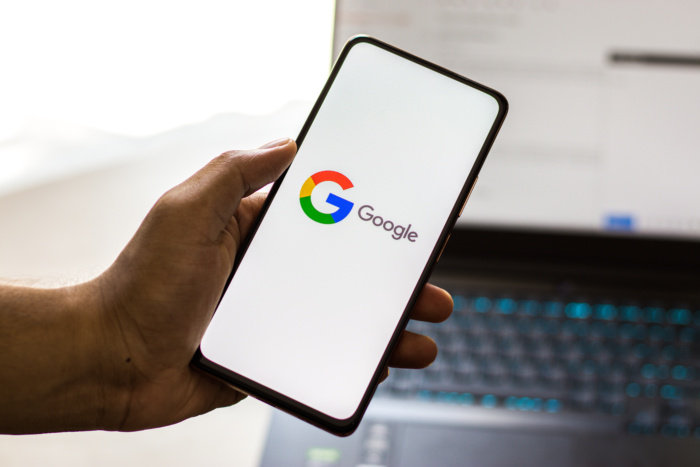 West Bangal, India – September 28, 2021 : Google logo on phone screen stock image.